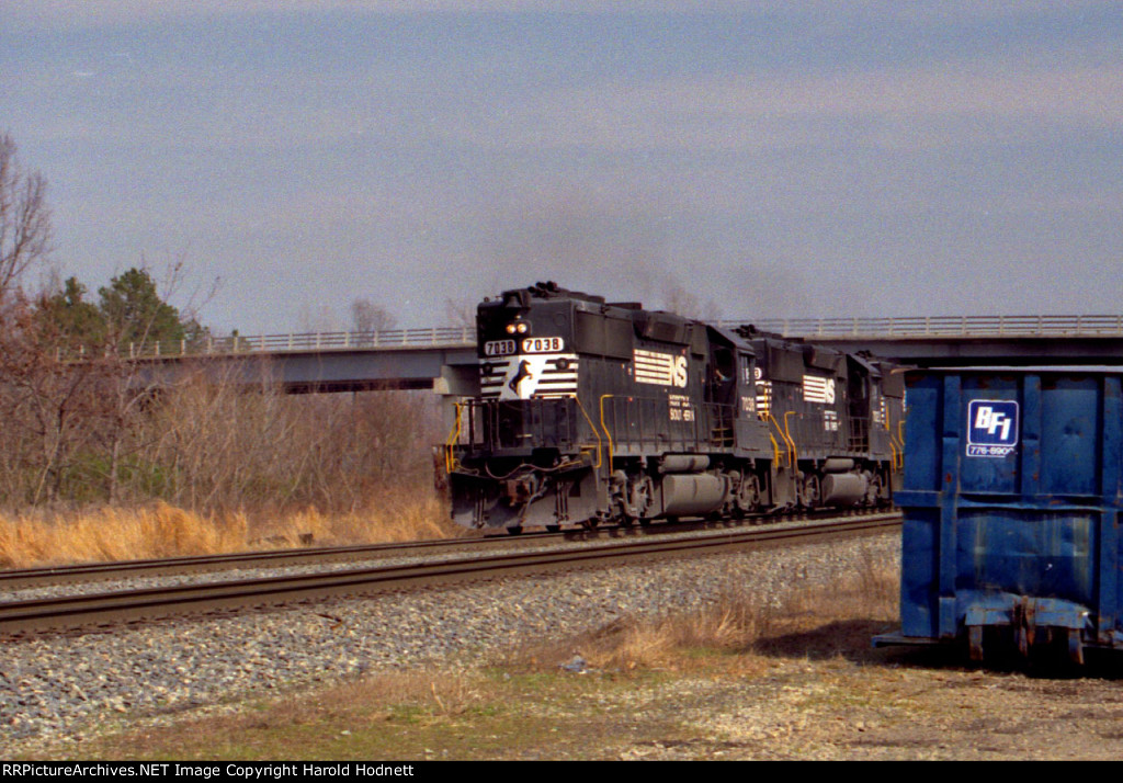 NS 7038 leads an intermodal train southbound